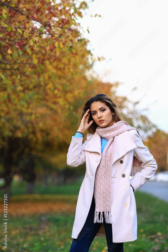 Young beautiful woman in autumn park posing Young beautiful woman in autumn park posing