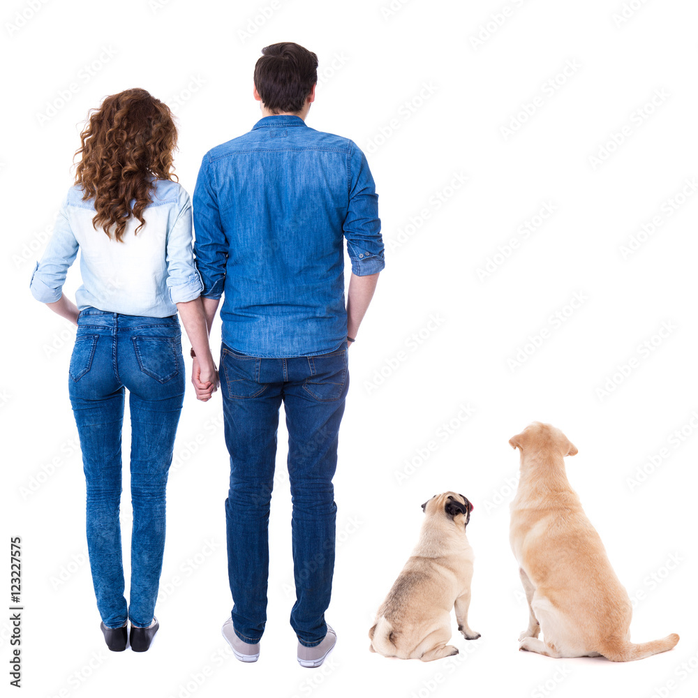 back view of lovely couple and their cute dogs isolated on white Stock ...