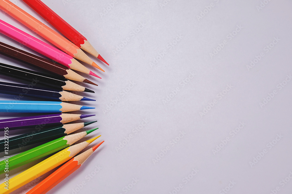 Color pencil with copy space on white background, education frame concept. Color pencil with copy space on white background, education frame concept.