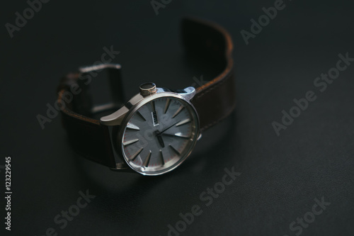 Close Up Classic Vintage watches with dark brown leather on black leather background