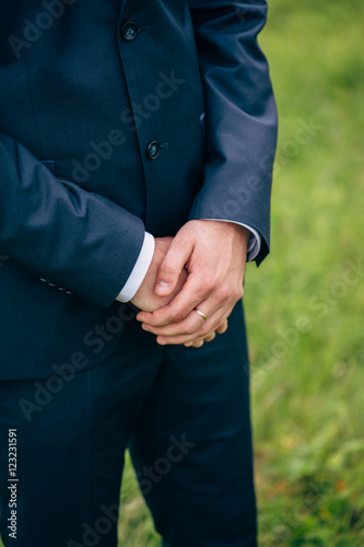 Fashion detail image of a groom wearing