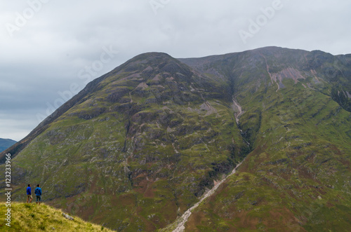 Aonach Eagach ridge above Loch Achtriochtan in Glencoe, Scotland photo