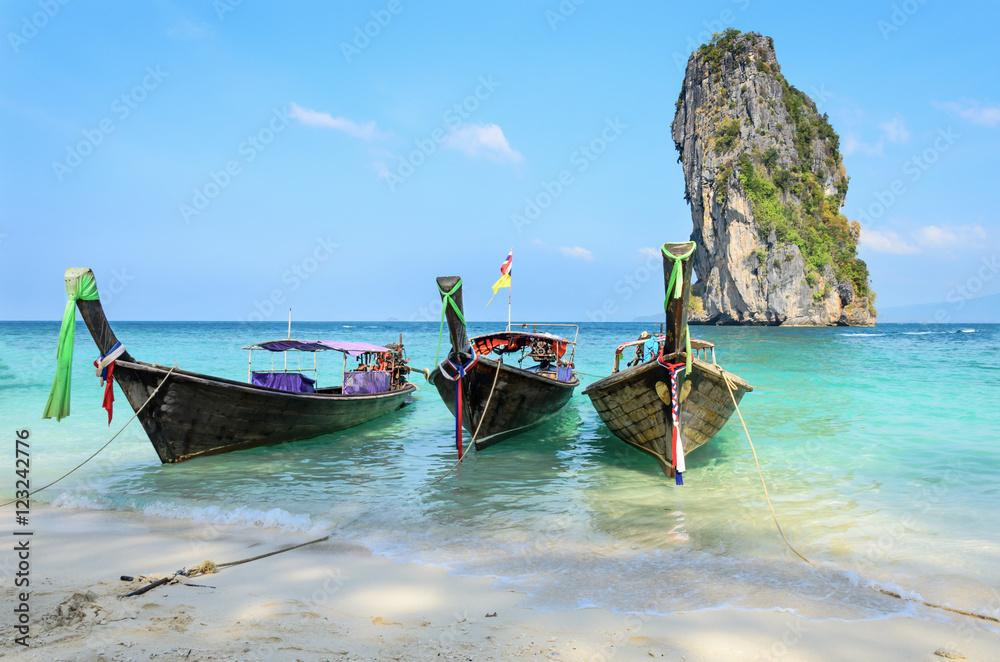 Long-tail Taxi boat on the beautiful beach, krabi, Thailand