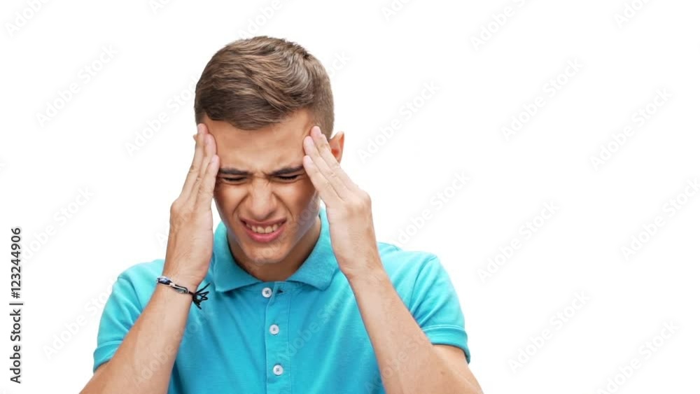 Sad young handsome man have headache over white background Slow motion Sad young handsome man have headache over white background Slow motion