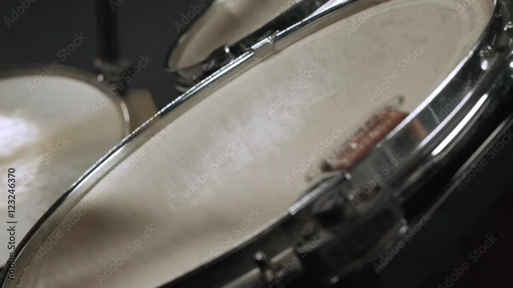 Close up view of drumsticks beating drum making rhythm Slow motion Close up view of drumsticks beating drum making rhythm Slow motion