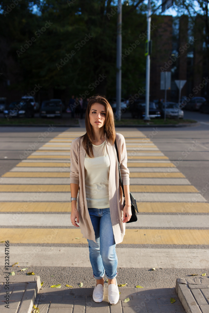 Portrait of beauty woman walking on the street