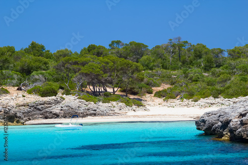 Cala des Talaier beach in sunny day at Menorca island, Spain.