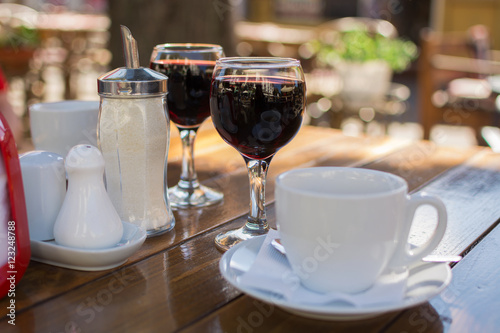 Fototapeta Naklejka Na Ścianę i Meble -  street cafes, wine glasses and a cup of coffee