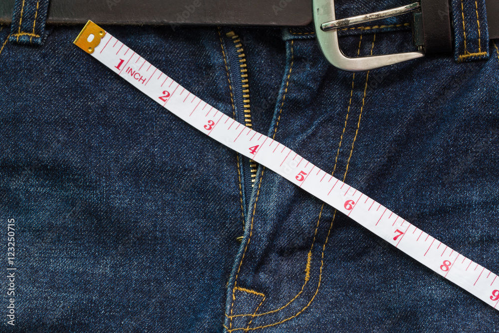 jeans open zip with measuring tape, penis size concept Stock Photo | Adobe  Stock