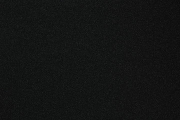 Black monotone grain texture. Glitter sand background.