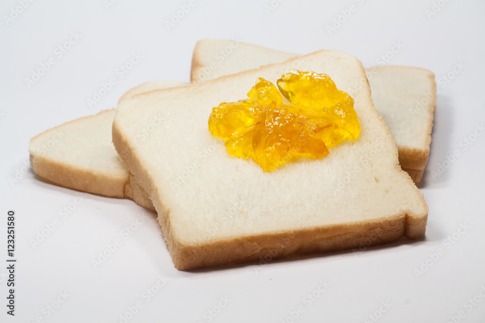 slice toast  and marmalade jam 
slice toast  and marmalade jam on a white background
