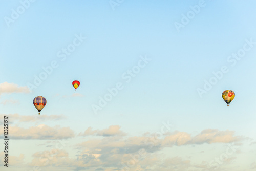 Hot air balloons above the clouds