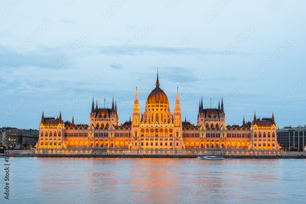 Budapest Parliament at dusk on the Danube river in Hungary.