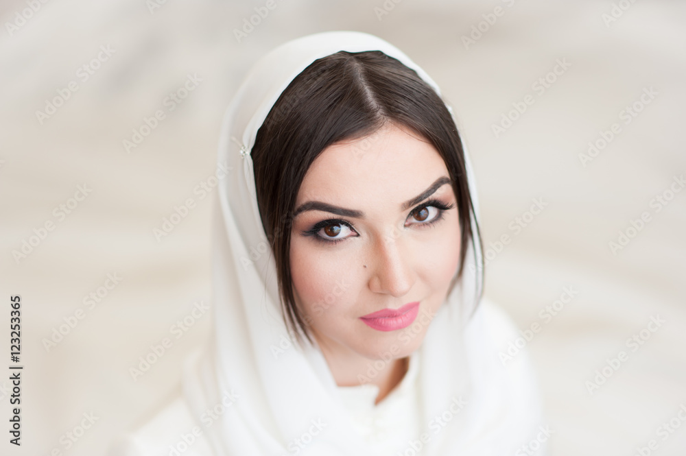 beautiful girl in hijab looks into the camera beautiful girl in hijab looks into the camera