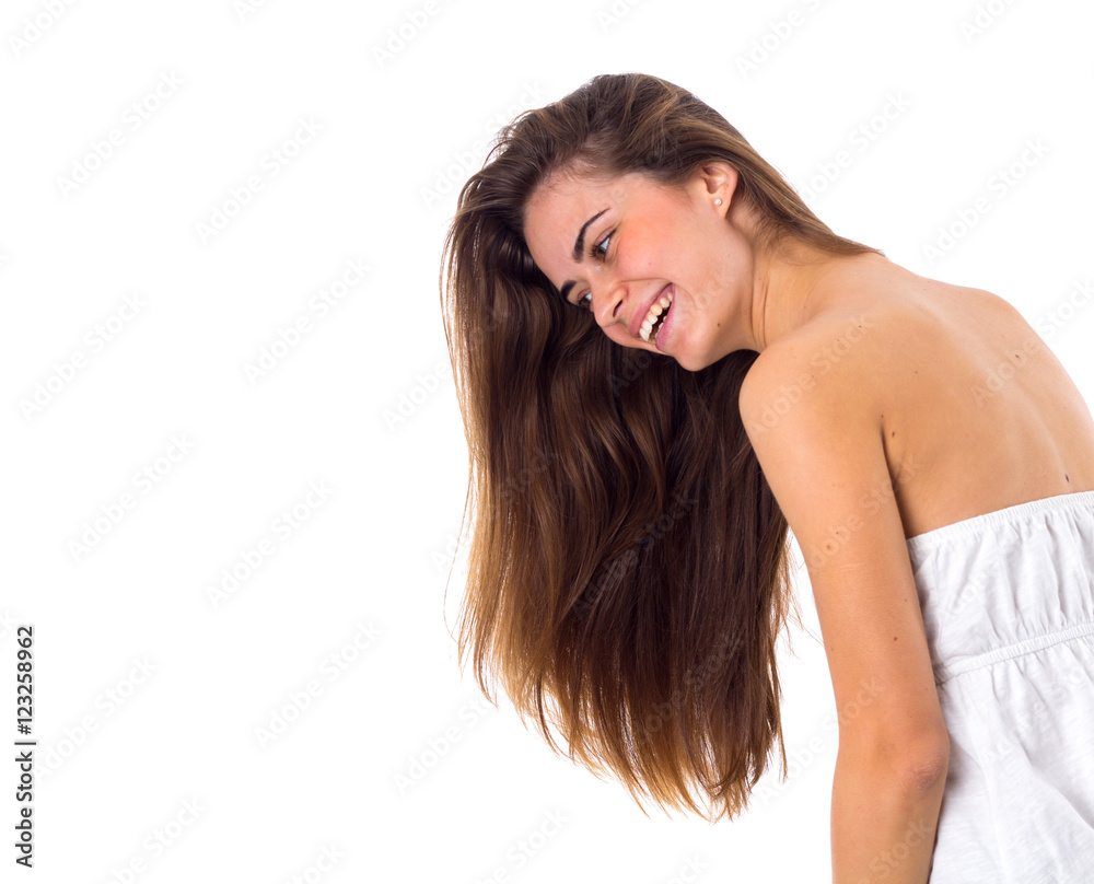 Smiling woman in white dress with long hair Smiling woman in white dress with long hair