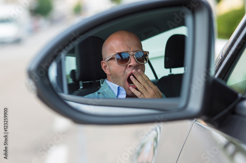 Obraz na płótnie Side mirror view reflection sleepy tired fatigued yawning exhaus