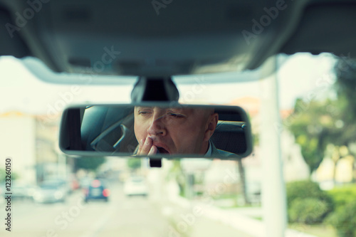 Wallpaper Mural Rear mirror view reflection sleepy tired fatigued yawning exhaus Torontodigital.ca