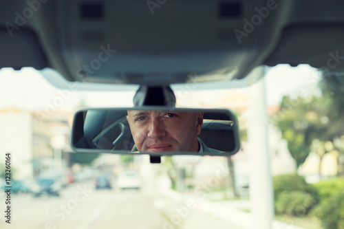 Wallpaper Mural Handsome serious business man driver looking sitting in front se Torontodigital.ca