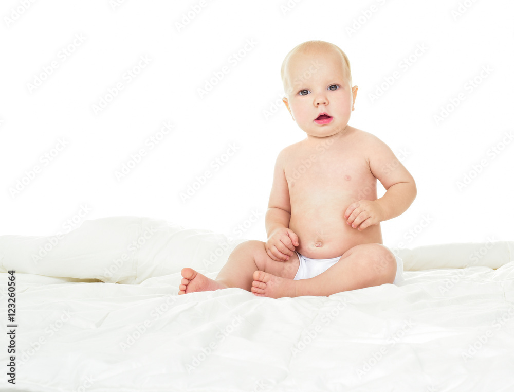 Beautiful smiling baby sitting. One, isolated on white. Beautiful smiling baby sitting. One, isolated on white.