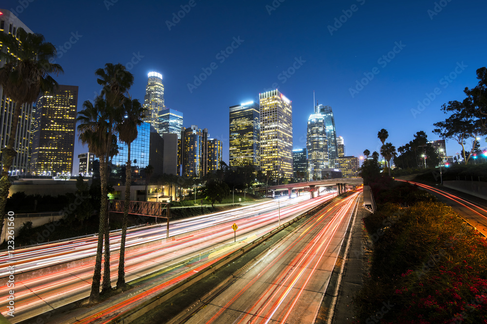 Naklejka premium Downtown Los Angeles at night with light trails