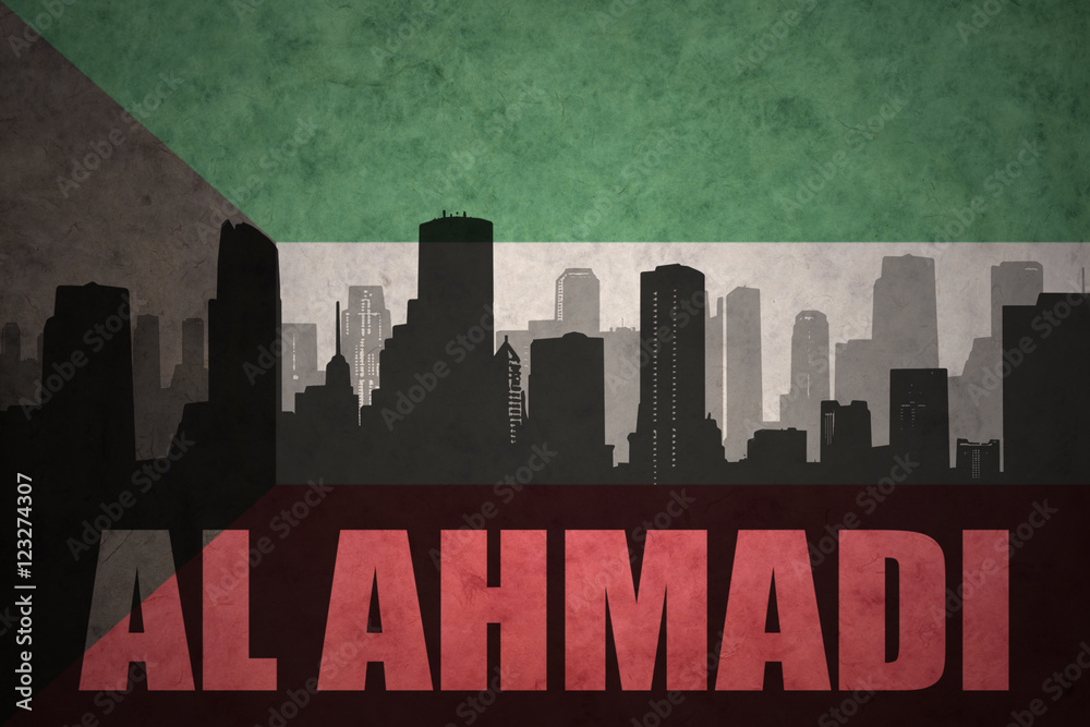 abstract silhouette of the city with text Al Ahmadi at the vintage kuwait flag background