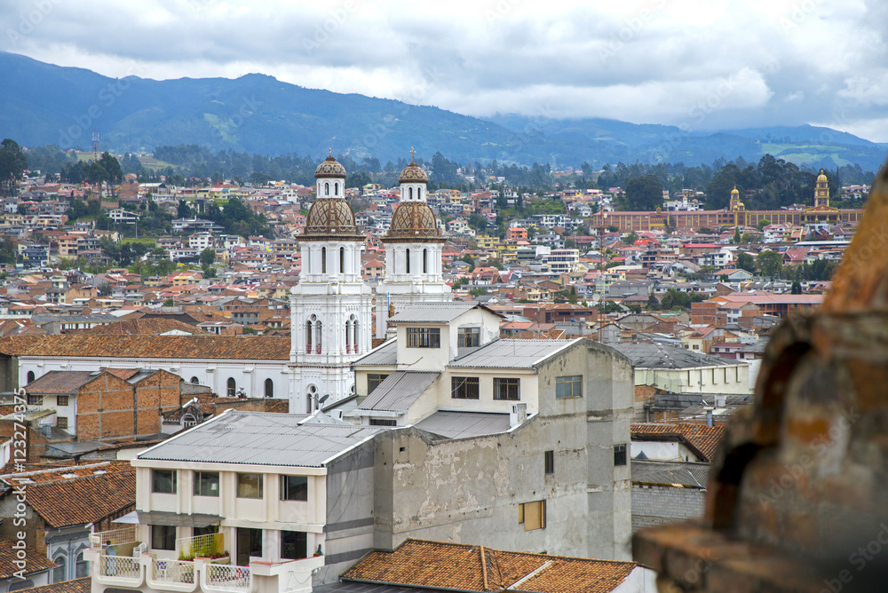 Churches and view of the city of Cuenca, Ecuador, on an overcast day