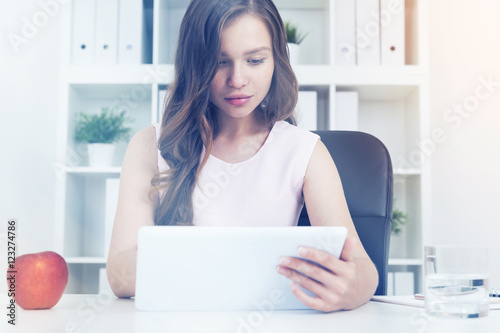 Apple on desk. Woman working. Free Download Apple on desk. Woman working. - GFXLoad