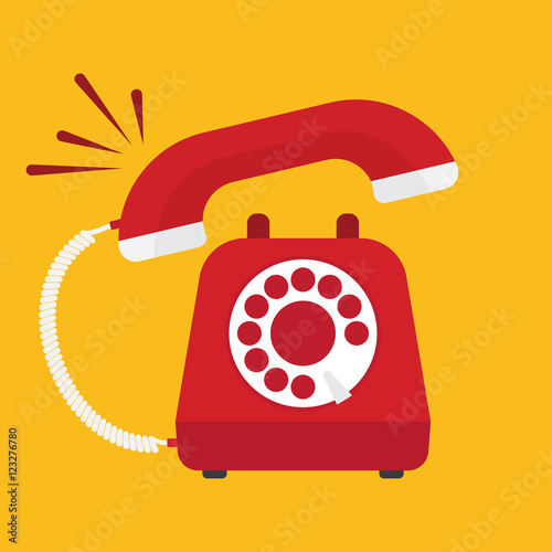 Retro styled red telephone ringing photo