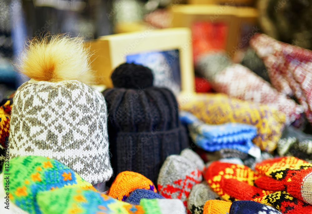 Pom pom hats displayed for sale at Riga Christmas market Pom pom hats displayed for sale at Riga Christmas market