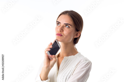 Woman holding her phone 