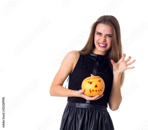 Woman holding a pumpkin