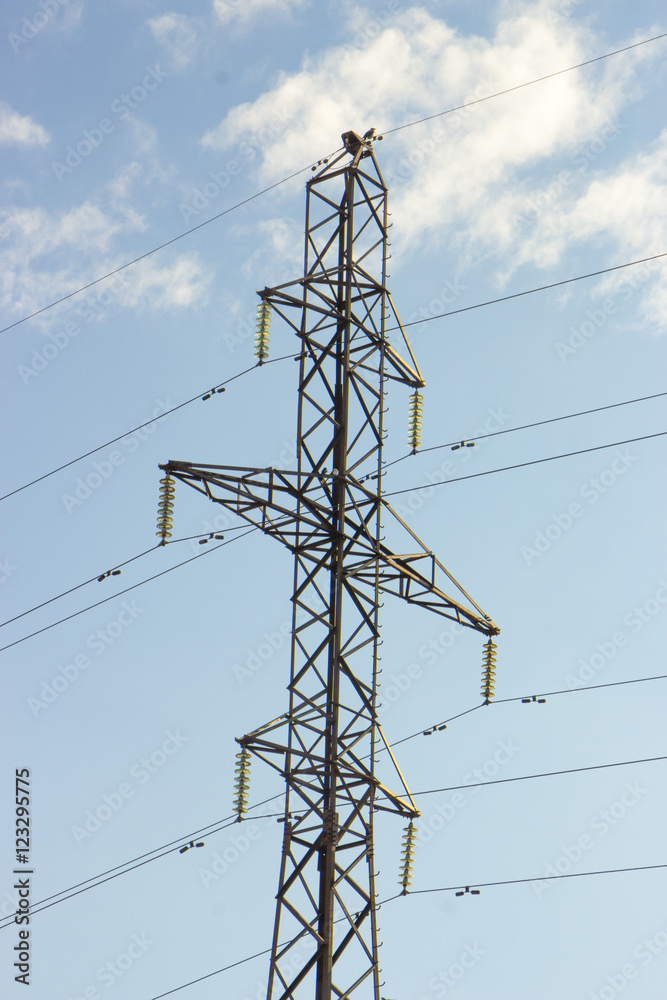 Overhead electrical power lines on steel transmission tower Overhead electrical power lines on steel transmission tower