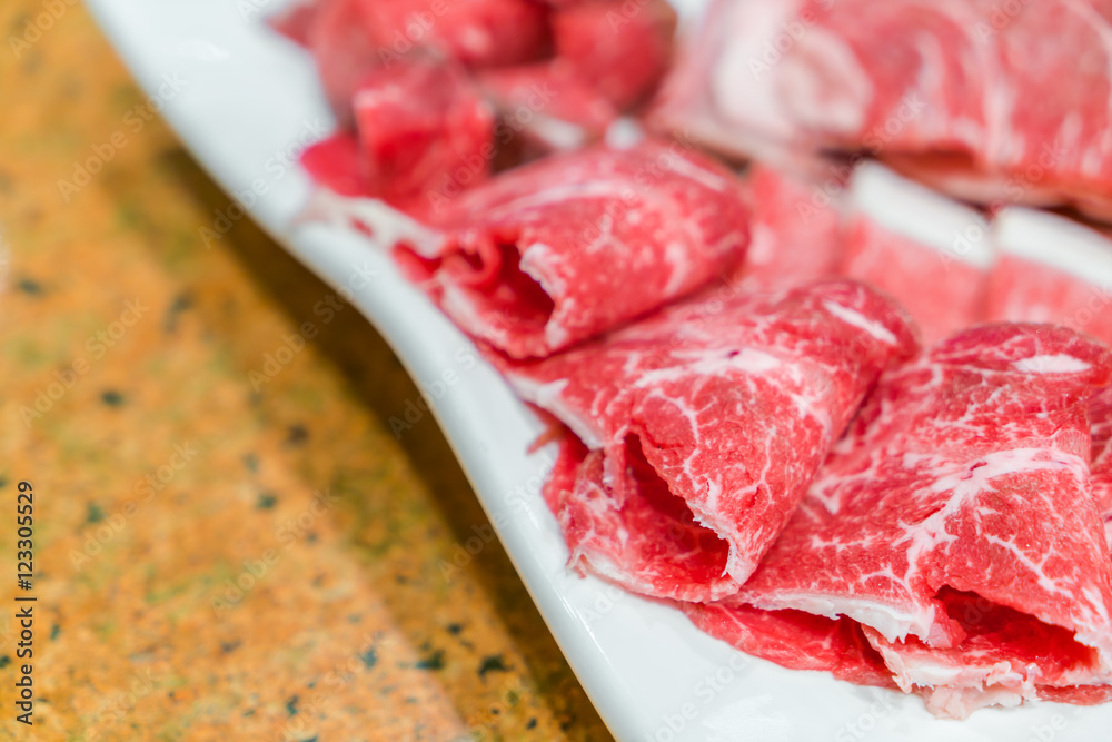 Uncooked raw fresh beef . Uncooked raw fresh beef .