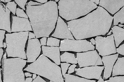 Cracked black and white concrete background