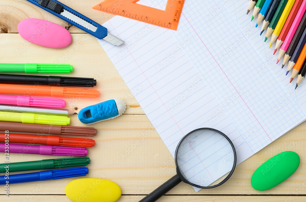 Naklejka premium School stationery with notebook copyspace