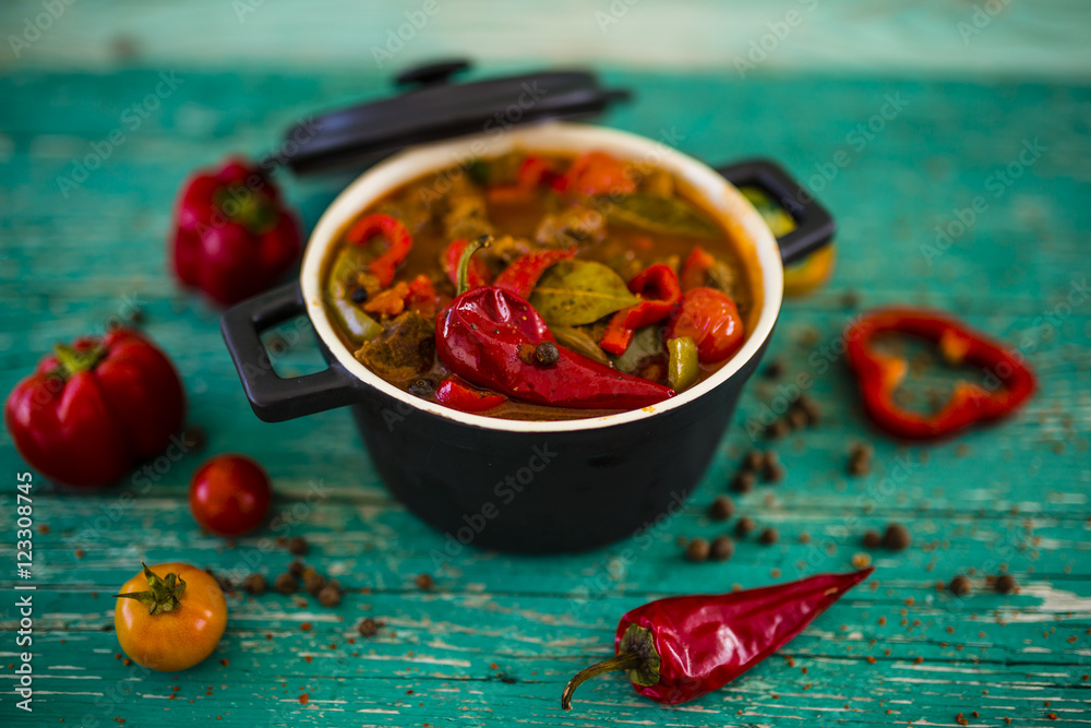 Delicious Hungarian goulash with beef and red pepper stewed with vegetables and herbs. Delicious Hungarian goulash with beef and red pepper stewed with vegetables and herbs.