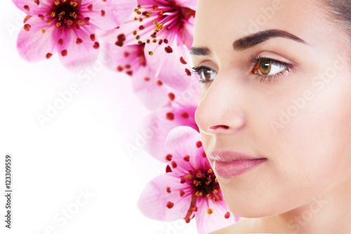 Beautiful woman on flowers ...