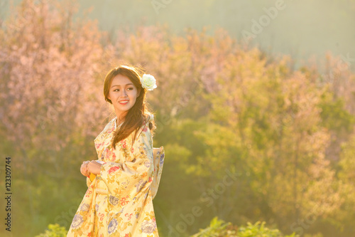 Beautiful woman wareing japan treaditional ,Spring Sakura Cherry Blossom, pink blossom sukura flowers,vintage style