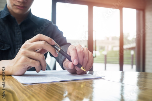 Businessman wearing casual clothes working, planning and thinkin photo