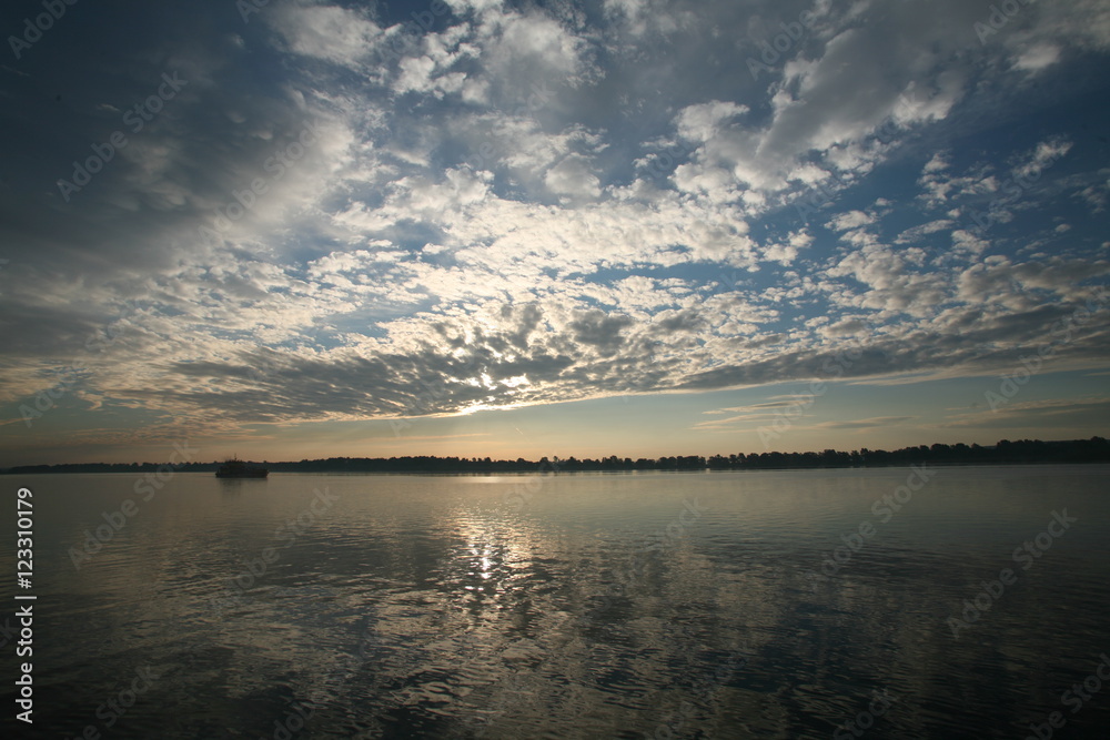 Fototapeta premium sunset over the river