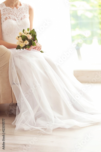 Bride in beautiful dress wi...
