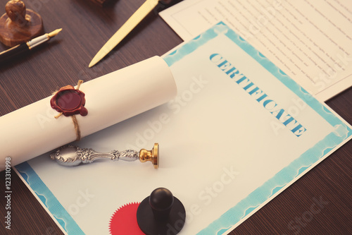 Old notarial wax stamp and documents on table