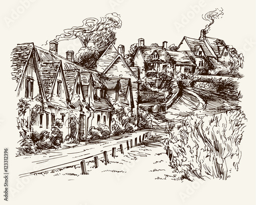 Houses of Arlington Row in the village of Bibury, England. Hand