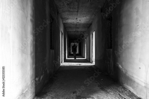 Abandoned building with Ghost walking in wallway