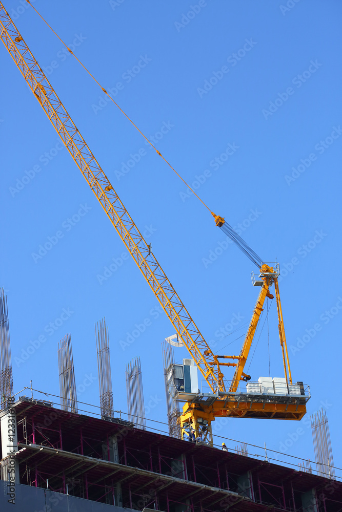 machinery crane working in construction site building