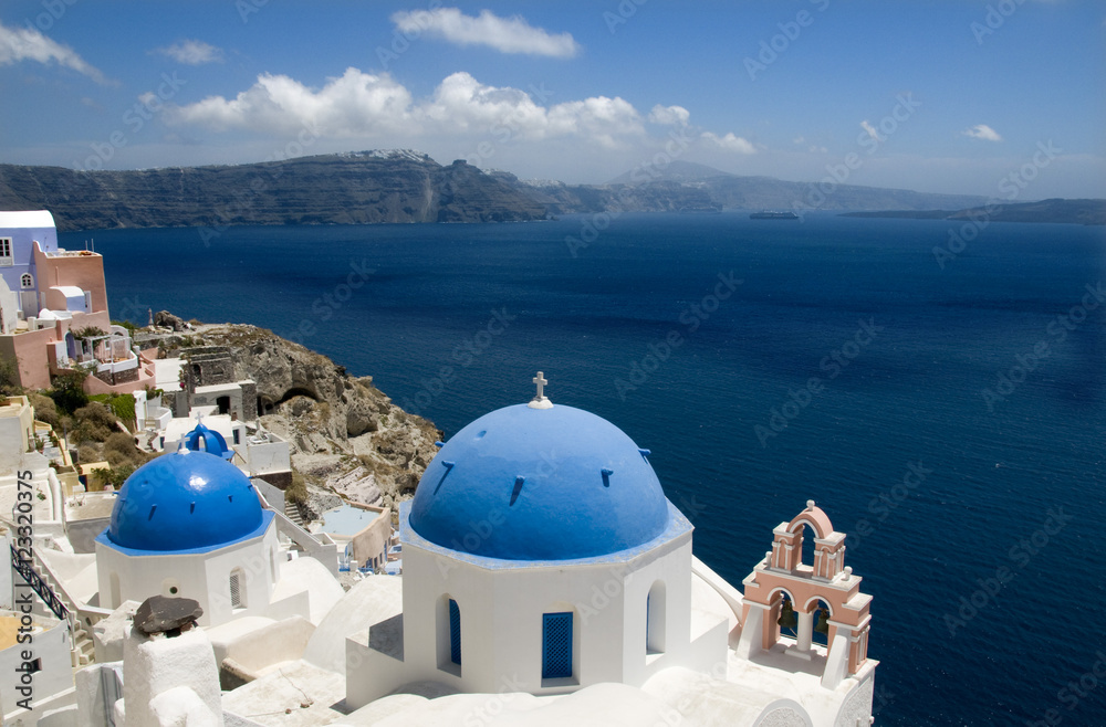 Fototapeta premium The village of Fira overlooking the sea on the island of Santorini, Greece