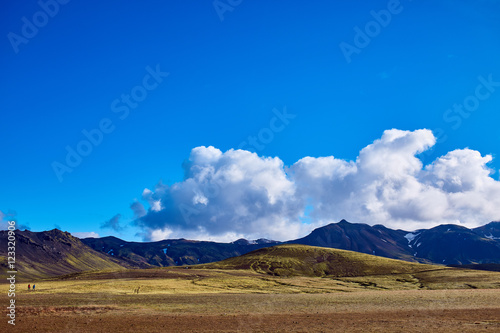 Travel to Iceland. Beautiful Icelandic landscape with mountains, sky and clouds. Trekking in national park Landmannalaugar