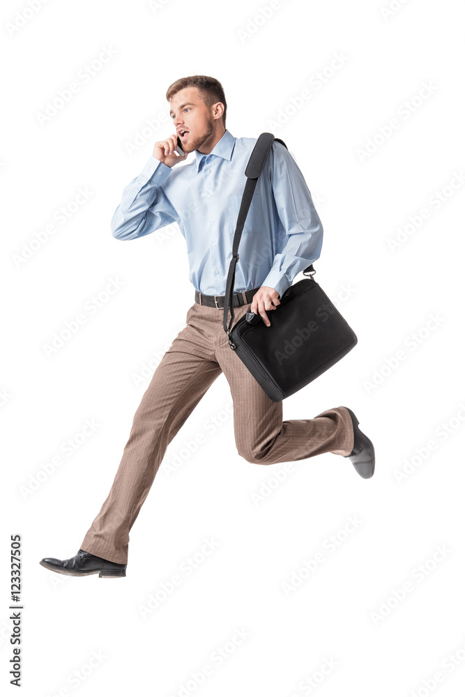 Business man running and speaking by phone Business man running and speaking by phone