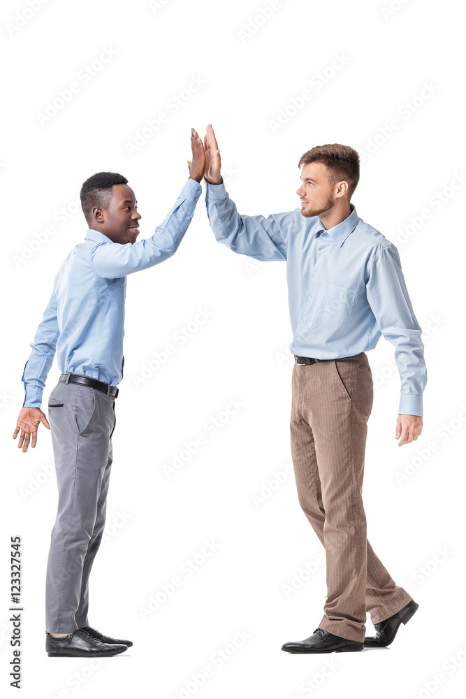 business men giving each other a high five business men giving each other a high five