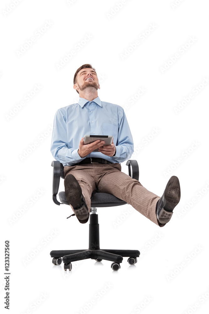 businessman sitting in chair and using tablet businessman sitting in chair and using tablet